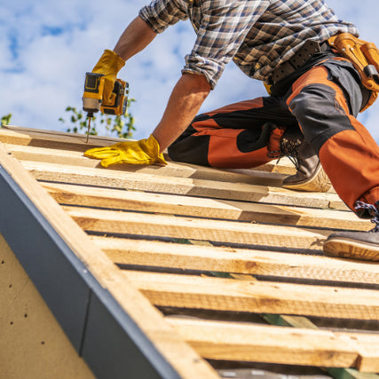 Contractor RentalsContractor working on a roof