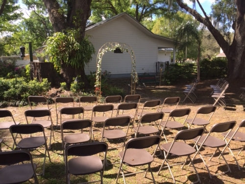 Party and event chairs set up inside of an alter